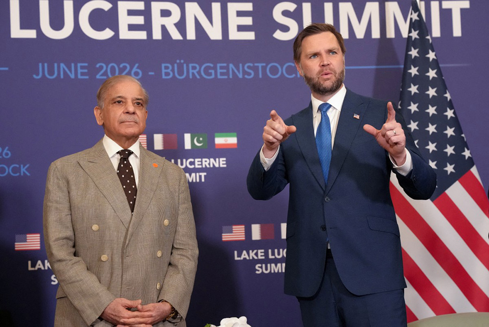 US Vice President JD Vance (R) meets with Pakistan's Prime Minister Shehbaz Sharif at the Burgenstock luxury hotel complex overlooking Lake Lucerne, Switzerland, on June 21, 2026, ahead of high-level talks aimed at advancing a deal to end the Middle East conflict. (Photo by Nathan Howard / POOL / AFP)