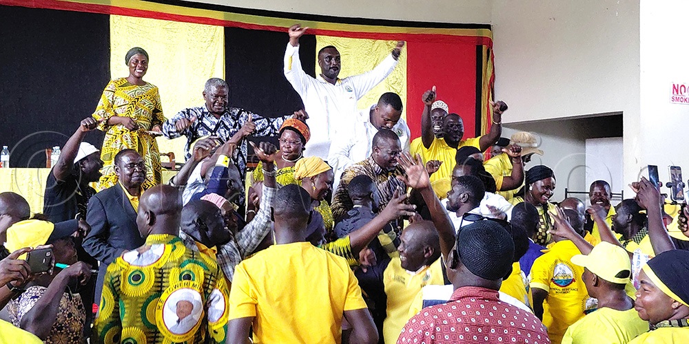 The NRM leaders dancing during a meeting with West Nile NRM leaders and flag bearers in Arua district. (Photo by Robert Adiga)