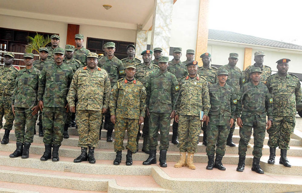  UPDF proximity commanders led by Maj. Gen Francis Takirwa, the UPDF deputy commander Land Forces (4th from left) and Brig. Gen Pascal Muhizi, the 5th commander RDF (3rd from left) shortly after attending a three-day Proximity commander meeting on Saturday held at Igongo Country Hotel in Mbarara city. (Credit: Abdulkarim Ssengendo)