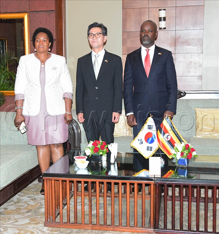 The Deputy Speaker of Parliament, Thomas Tayebwa (right), with the Korean Ambassador to Uganda Park Sung-Soo (middle), the Deputy Minister of Land, Housing and Urban Development, Persis Namuganza at Sheraton Hotel. 
