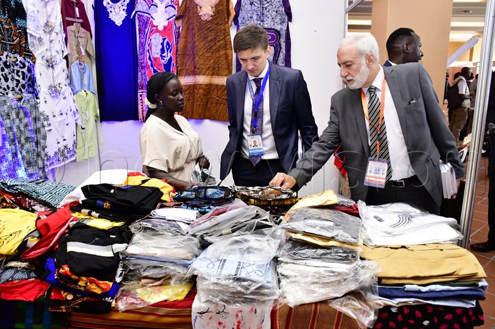 Russian delegations touring Ugandan fabric stalls during the 3rd Uganda - Russia Intergovernmental Commission on Economic, Scientific and Technical Cooperation, alongside a dynamic Business Conference at Munyonyo Commonwealth Resort in Kampala, on September 7, 2025. (Credit: Hajarah Nalwadda)