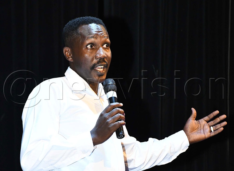 Pablo Kimuli cracking jokes during the One Night Stand Comedy show at National theatre last Friday. Photo by Ignatius Kamya
