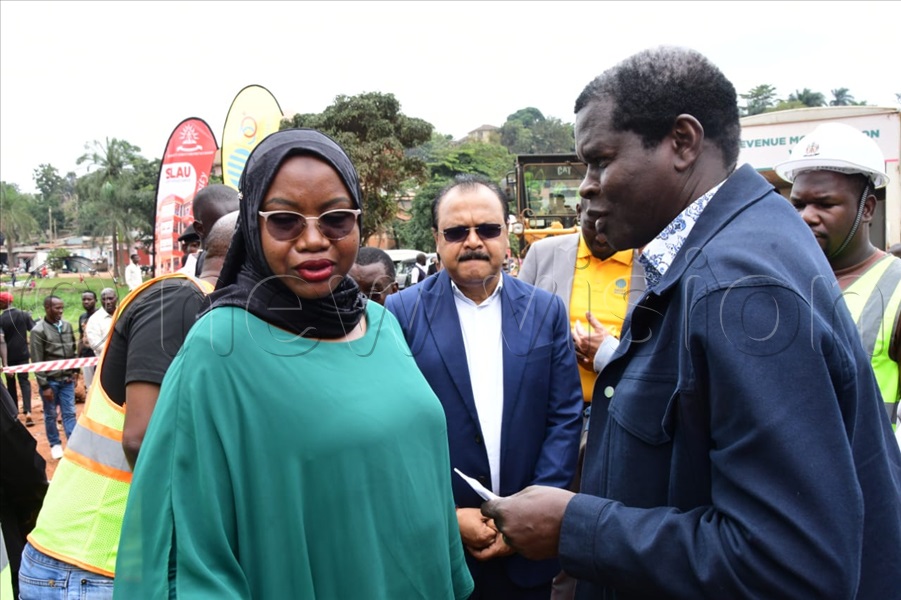 Miracle Centre Church senior Pastor Robert Kayanja and KCCA executive director, Hajati Sharifah Buzeki.