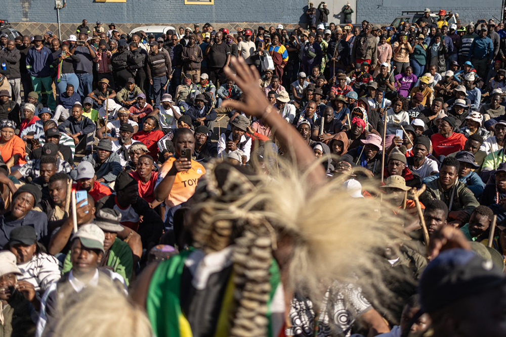 Nkosikhona "Phakelumthakathi" Ndabandaba addresses the crowd during a protest march against undocumented migrants in Springs, Ekurhuleni, on June 8, 2026. (AFP)