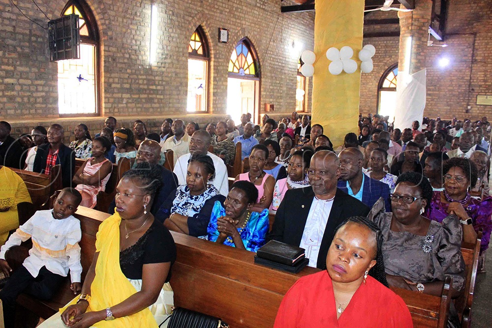 Some of the members of the congregation listening to Bishop Enos Kitto Kagodo's sermon during the Christmas service at Mukono Cathedral. (Photo by Henry Nsubuga)