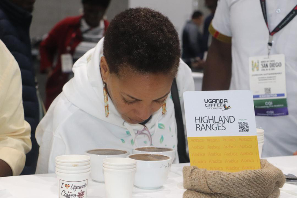 One of the attendees smelling the aroma of Ugandan coffee during the San Diego Expo. (Courtesy)