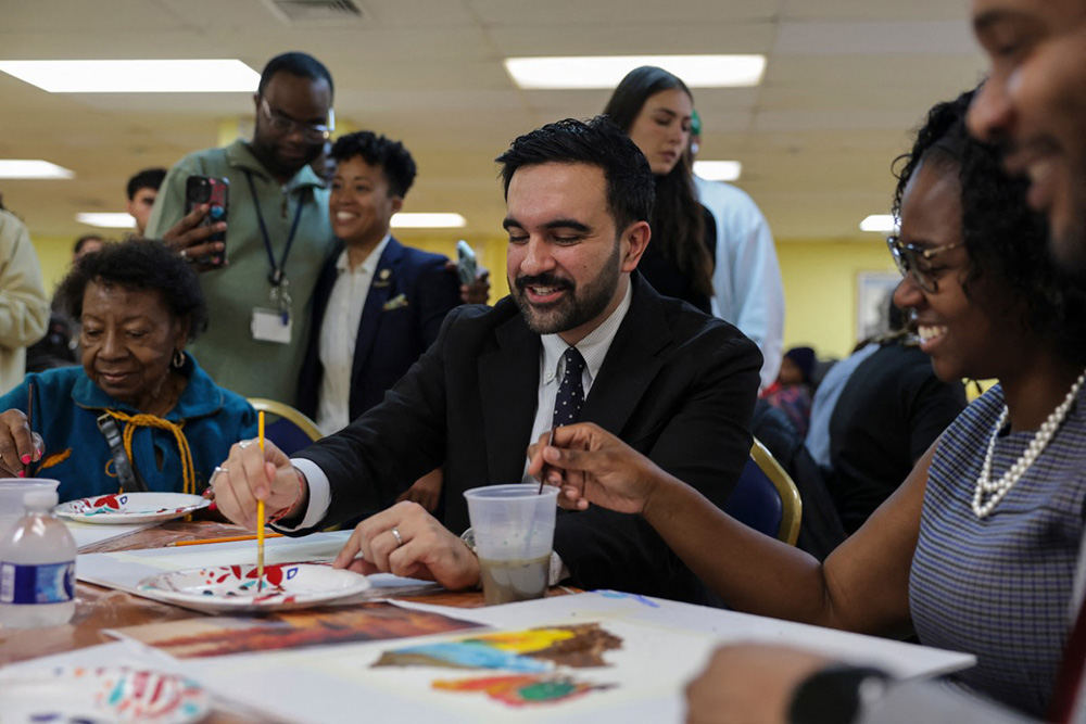 Democratic New York mayoral candidate Zohran Mamdani attends a “Paint and Pour” event while campaigning at a Senior Center in the Brooklyn borough of New York on October 30, 2025. (Photo by ANGELA WEISS / AFP)