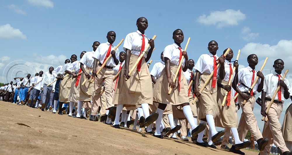 Some of the students who graduated from the Patriotism Programme at Amuria Secondary School take part in a march past during the pass-out ceremony in Amuria District on Monday, July 13, 2026. (Photo by Delux Emmy Alomu)