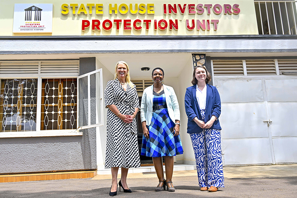 State House Investors Protection Unit (SHIPU) head Col. Edith Nakema (center) in a group photo with the British High Commissioner to Uganda Lisa Chesneyon (left) and British High Commission's Trade and Prosperity officer Crosby Kate (right) during an official visit. (Photo by PPU/Tony Rujuta)