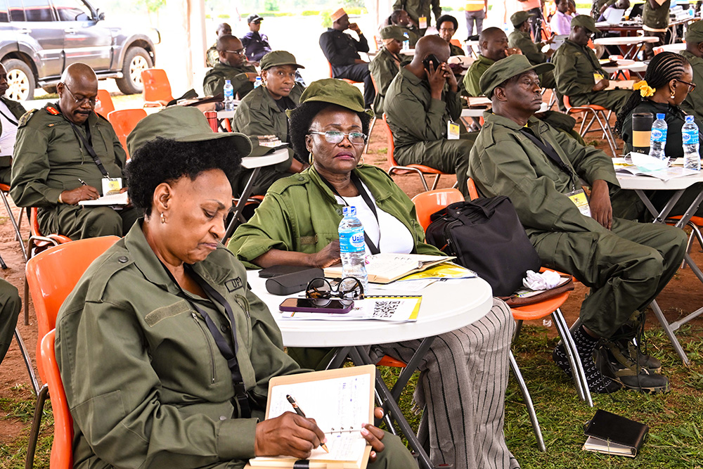 Minister for Elderly Affairs Jacqueline Mbabazi (L) and other ministers attending a ministers retreat at Kyankwanzi on Monday. (PPU Photo)