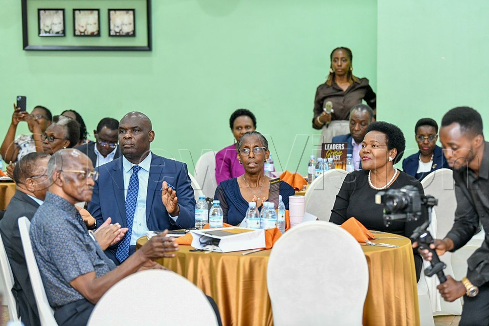Supreme Court Justice, Mike Chibita, with wife, Prof. Monica Chibita and Irene Kauma, the undersecretary/senior private secretary to the First Lady and the Minister of Education and Sports.