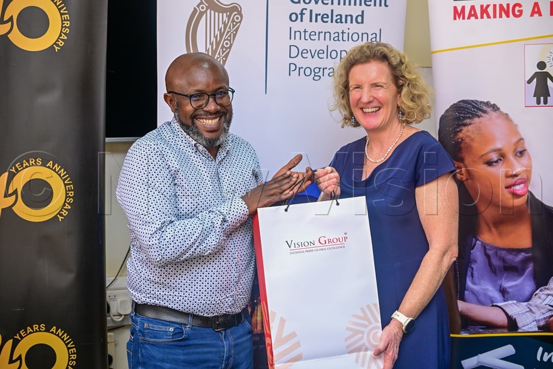 Vision Group CEO Don Wanyama presents a gift to Ireland's Ambassador to Uganda, Mags Gaynor. (Credit: Miriam Namutebi)