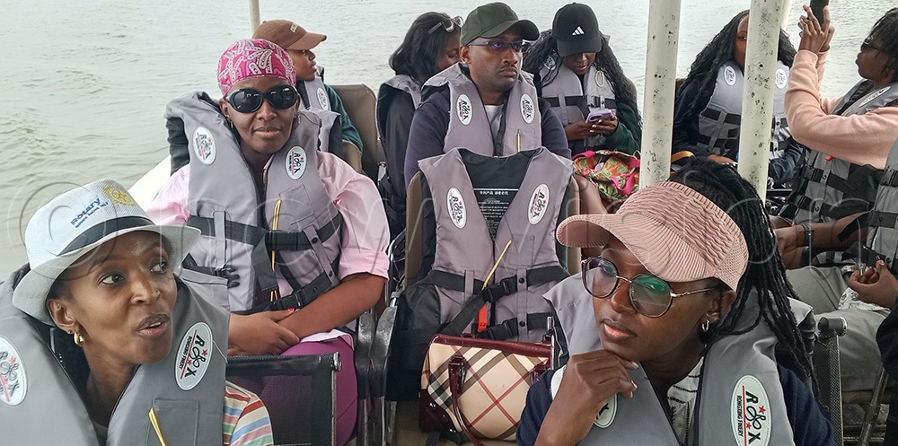 Members of the Rotary Club Kigali Virunga based in Rwanda enjoying a boat cruise at the Kazinga Channel in Kasese District. (Photo by Samuel Amanyire)