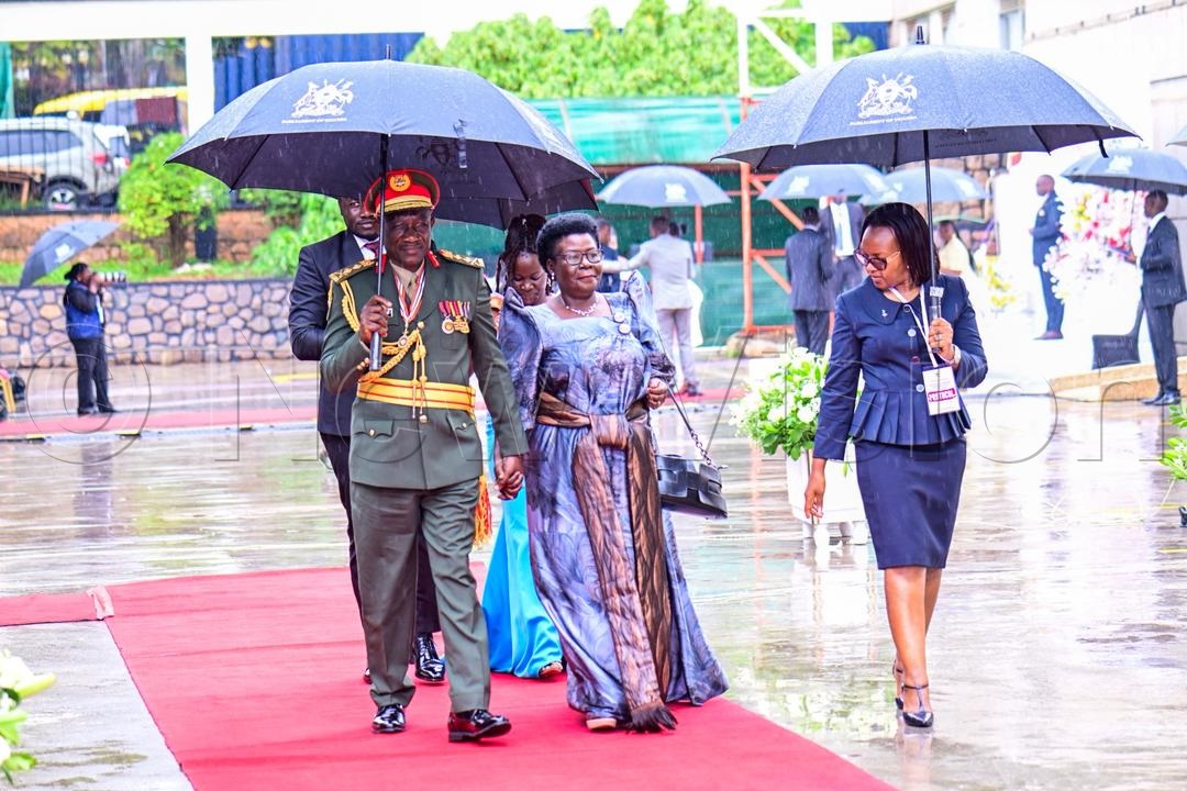 Maj. Gen. James Kinalwa arrives with family. (Photo by Miriam Namutebi)