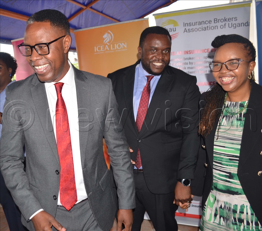 (L-R) Conference Convener and Chairman Edward Nambafu, Daniel Kairu and Anne Njugi Chief Operating officer ICEA interacting after addressing Journalists on the upcoming Annual conference. 