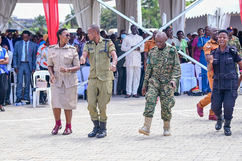 Members from security forces join the faithful to worship.