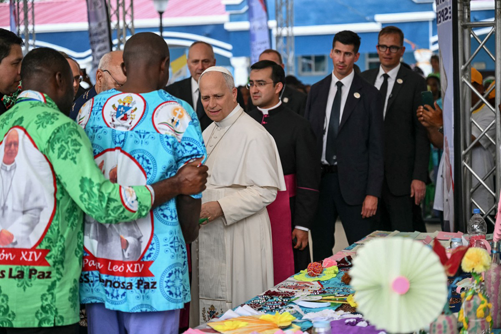 Pope Leo XIV (C) visits the staff and patients of the "Jean Pierre Olie" Psychiatric Hospital in Malabo on the ninth day of an 11-day apostolic journey to Africa, on April 21, 2026. 