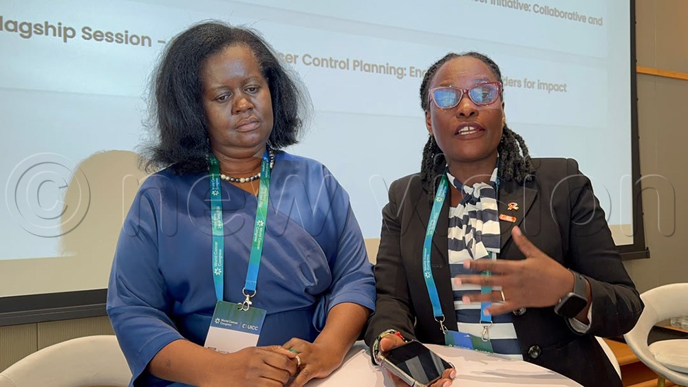 Uganda’s cancer epidemiologist Dr Annet Nakaganda on the left with Dr Sharon Kapambwe, who works with the WHO European Region. (Photo by John Musenze)