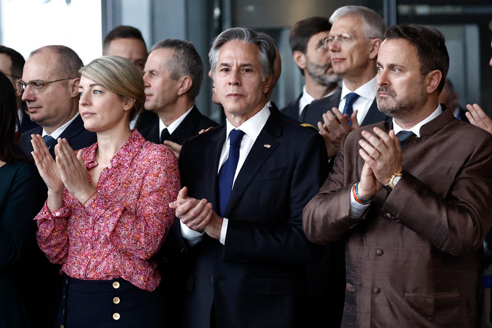  From left: Canadian Minister for Foreign Affairs Melanie Joly, US Secretary of State Antony Blinken and Luxembourg's Minister for Foreign Affairs Xavier Bettel, clap as they listen to speeches marking the North Atlantic Treaty Organization alliance's 75th anniversary at the NATO Headquarters in Brussels on April 4, 2024. 