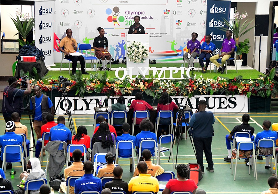 Students deliberate on issues about Olympism during the one-day Olympic Values Contest at Olive School, Namugongo. Photo: Silvano Kibuuka