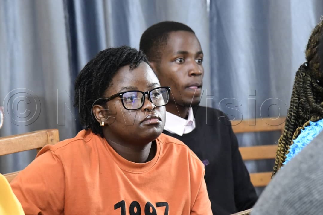A student paying close attention during the orientation. (Credit: Eddie Ssejjoba)