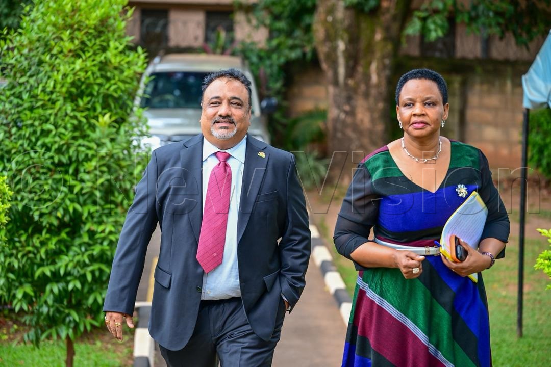 Sanjay Tanna, Minister of Trade, Industry and Cooperatives and Col Edith Nakalema. (Credit: Miriam Namutebi)