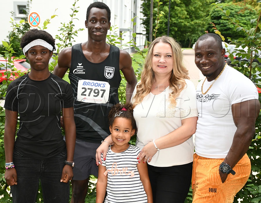 Ivan Byekwaso poses with his collection of medals won from the different events in Germany. Photo by Michael Nsubuga