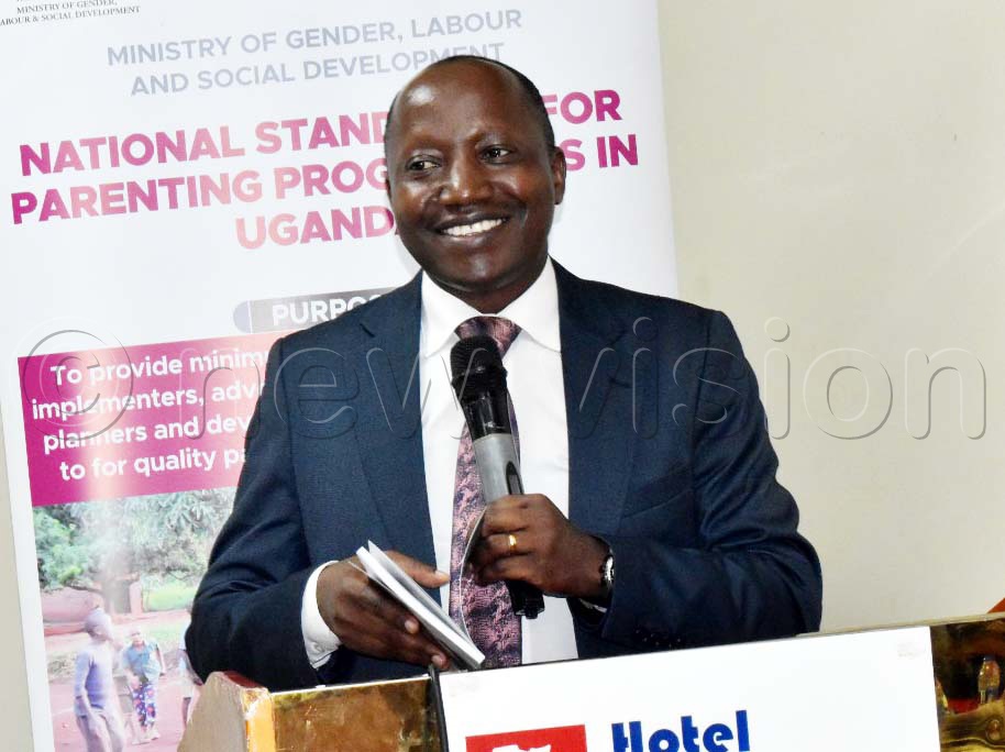 Dr. Godfrey Siu, a Senior Lecturer at Makerere University’s Department of Child Health and Development Centre speaking during the graduation of  professionals who completed a course in the Science of Evidence-Based Parenting Interventions at Hotel Africana. (Photo by Violet Nabatanzi)