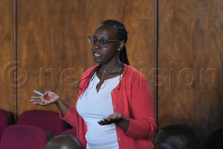 Patience Kaitesi, the Senior Youth Officer, from the MGLSD, explaining to stakeholders in Mbale the importance of childcare facilities in Mbale Market.