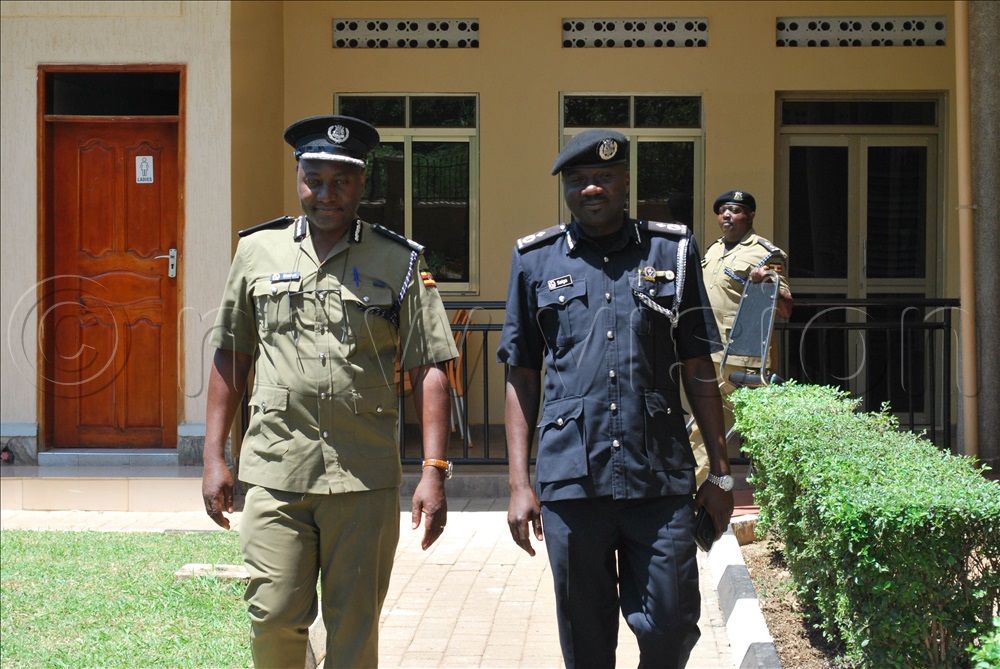 Senior Commissioner of Police Dr John Kamya with the regional police commander Kyoga East, Ibrahim Siaga, after the training on Monday in Soroti city.
