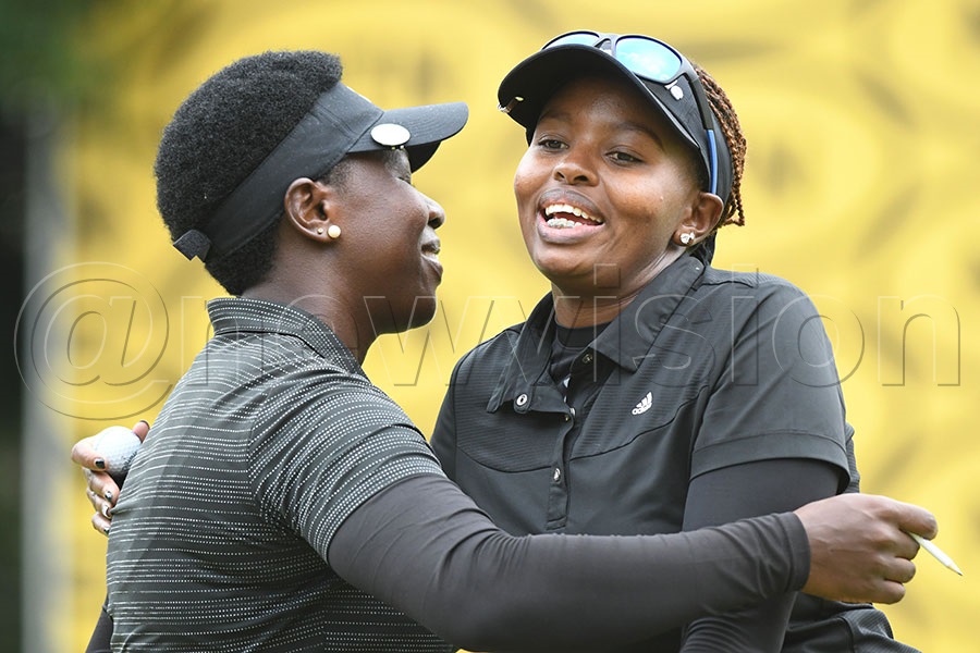 Peace Kabasweka (left) hugs Mercy Nyanchama after their second round of the MTN Entebbe Ladies Open at the Entebbe course, February 27, 2026. Photo by Michael Nsubuga 