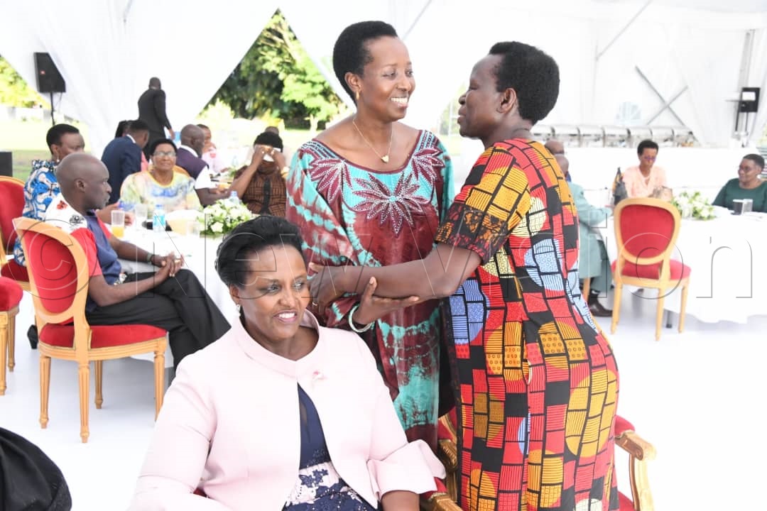 Former UNRA boss Allen Kagina chatting with Dr Kedrace Turyagyenda.