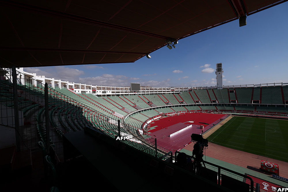 A camera operator tests their equipment at the Agadir Grand Stadium