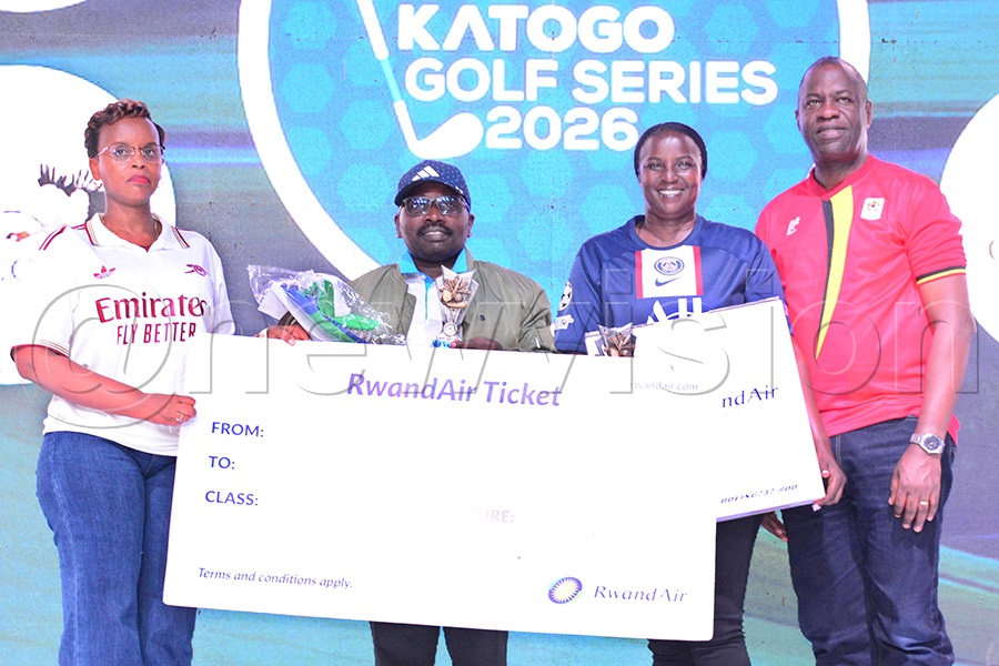 RwadAir Country Manager Vennah Mukumburwa (left) and I&M Bank's Executive Director San Ntulume (right) pose with the overall winners Conrads Ahimbisibwe (2nd left) and Peace Hellen after the second quarter Katogo championship at Entebbe Club, May 30, 2026. Photo by Michael Nsubuga