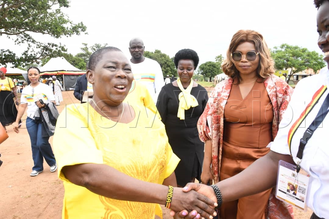 Zoe Bakoko Bakoru (L) warmly welcomed for the event. (Credit: Eddie Ssejjoba)