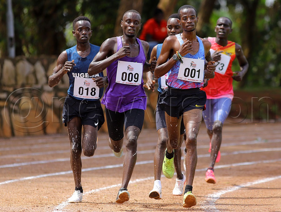 Seth Akampa (001) leads the pack in the 10,000m before falling out with less than five laps to go. PHOTO: Johnson Were