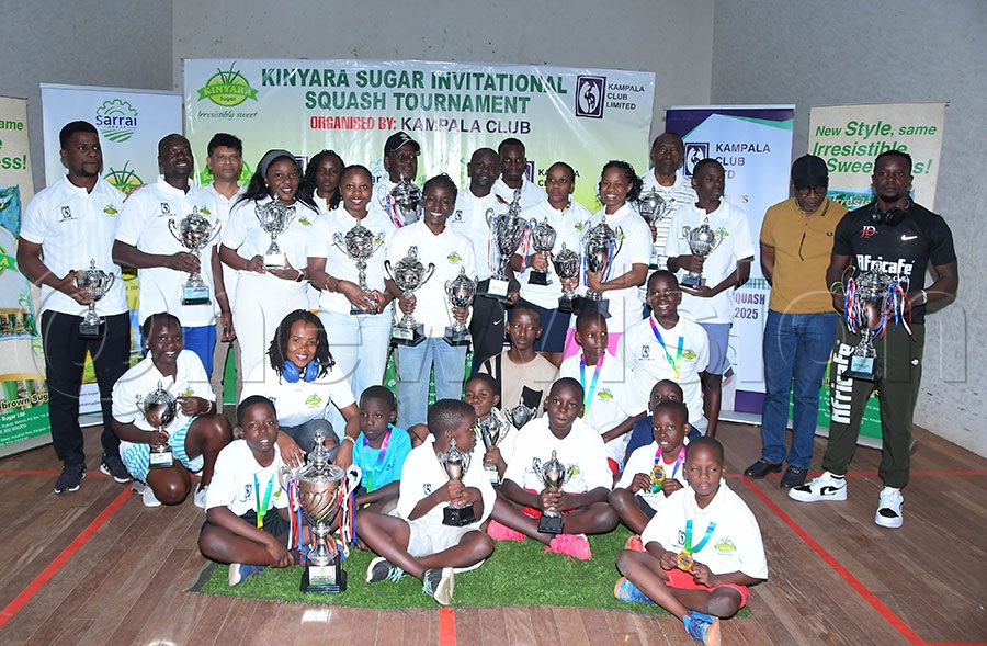 Winners in the diferent categories of the 2025 Kinyara Suga Invitational Squashg tournament with trophies at Kampala Club. Photo: Silvano Kibuuka