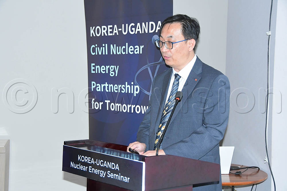 Senior manager for overseas NPP project office for Korea Hydro and Nuclear Power Company Ltd Jong Yun Kim deliberating at the workshop at Four Point by Sheraton over the progress of Nuclear energy in Uganda. (Credit: Silvano Kibuuka)