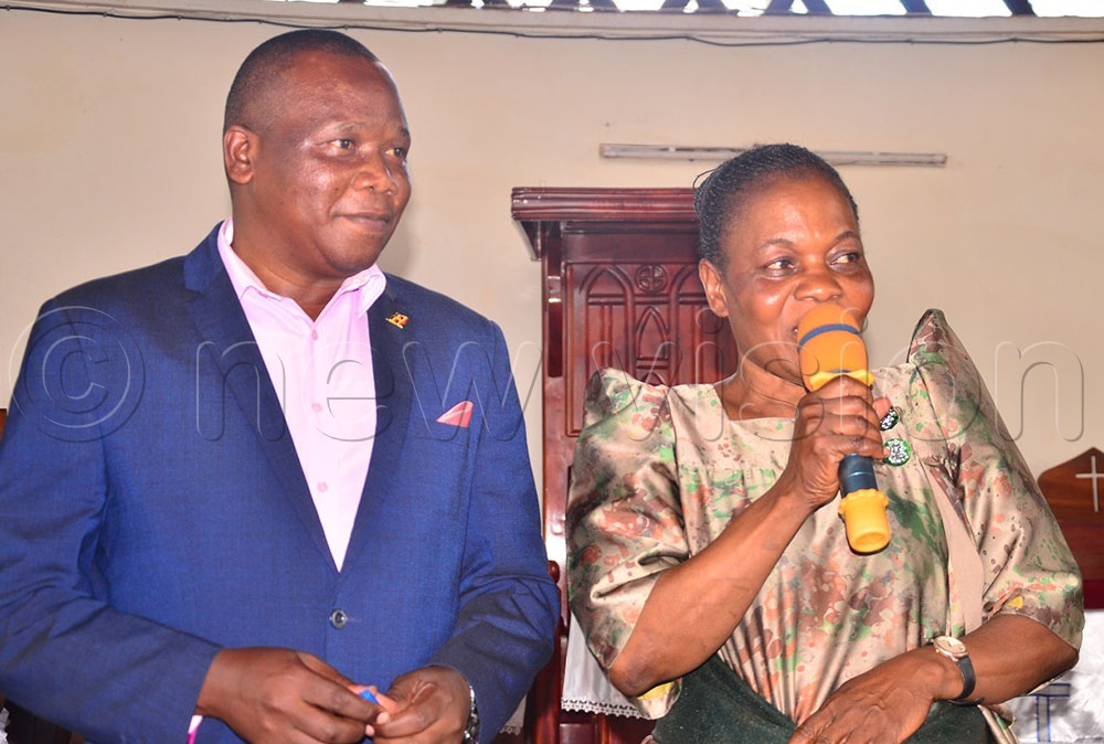 Jenipher Kongo and Stephen Wante during prayers at the catherdal where they represented Kadaga and solicited for the NRM support on Sunday. (Credit: Jackie Nambogga)