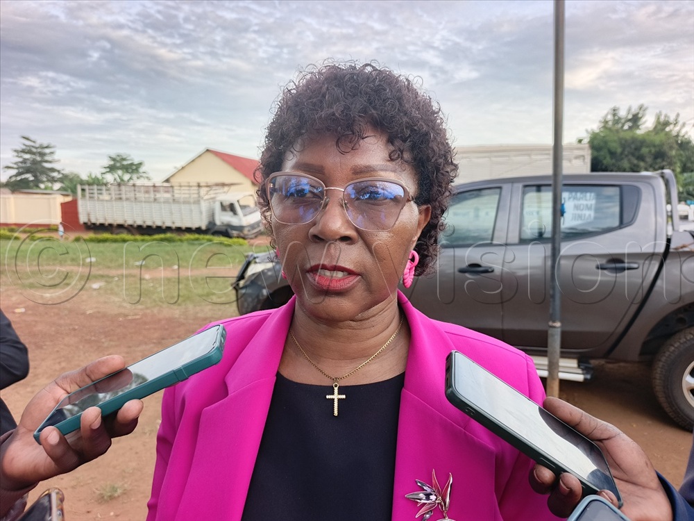 Jinja district returning officer Sarah Catherine Kabukaire speaking to journalists.