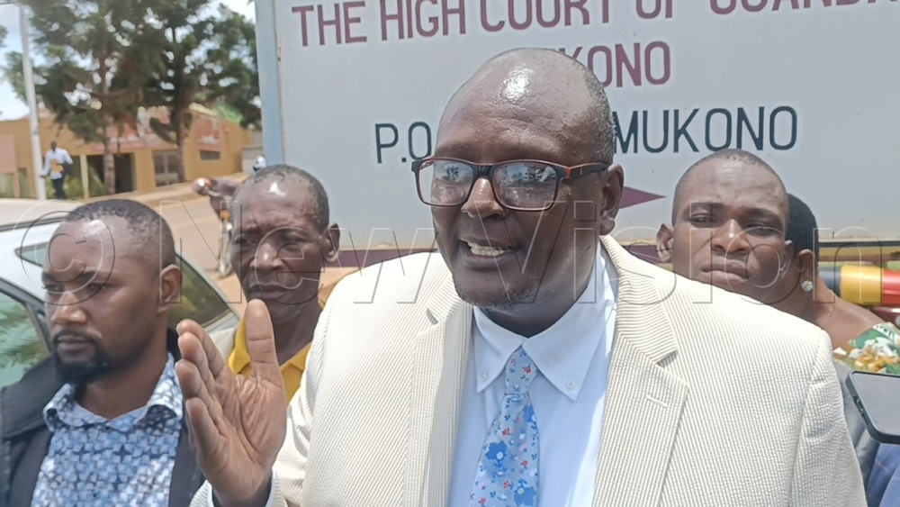 Former NRM candidate Arthur Kiiza addressing the media after court proceedings. (Credit: Eric Yiga)