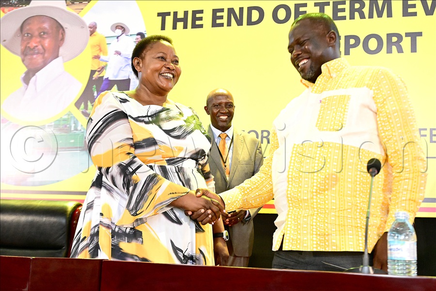 The Minister of the Presidency Milly Babirye Babalanda (L) interacts with Secretary General of the National Resistance Movement Richard Todwong (R) as Director for NRM-Manifesto implementation Wills Bashasha (C) looks on. This was at the Office of the Presidency in Kampala on April 21, 2026.