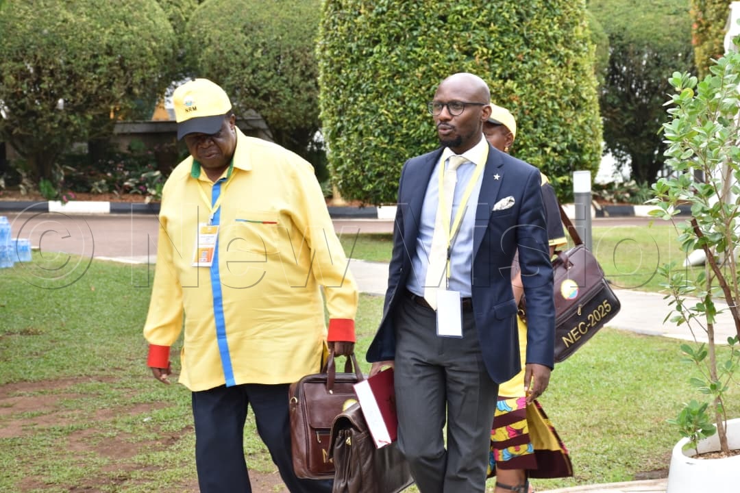 Kahinda Otafiire and Enoch Barata arriving at State House.