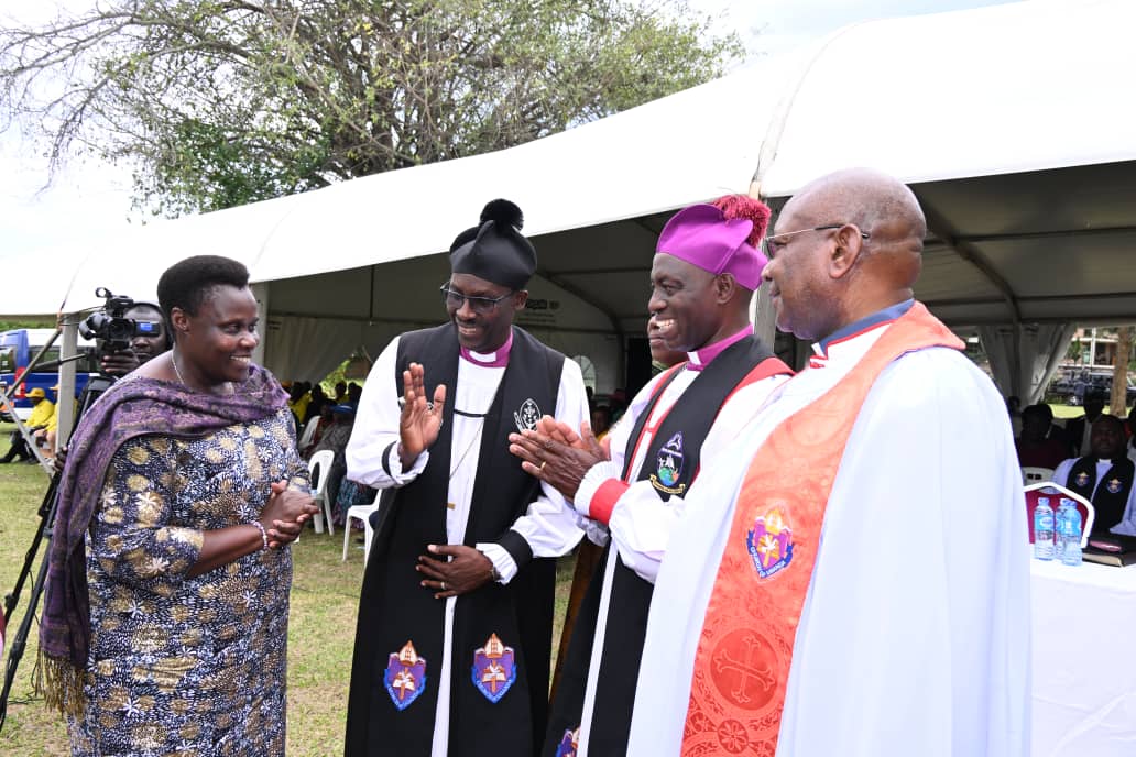 Vice-President Jessica Alupo received by the clergy during the final send-off of Kazoora's son, Mathew Richard Rubahama Kazzora. (Courtesy)