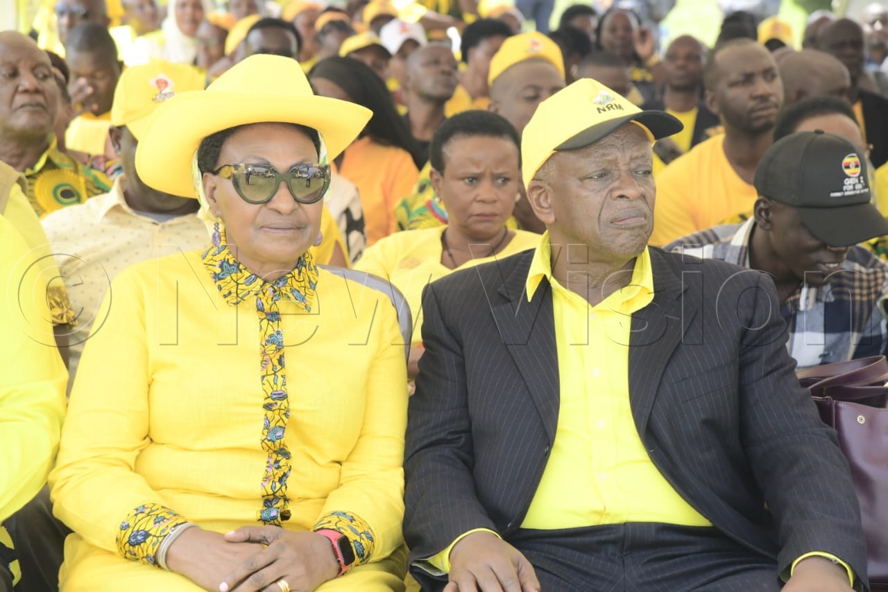 Former Prime Minister of Uganda, Amama Mbabazi with Jacqueline Mbabazi during the campaign rally in Kanungu. (Credit: Eddie Ssejjoba)