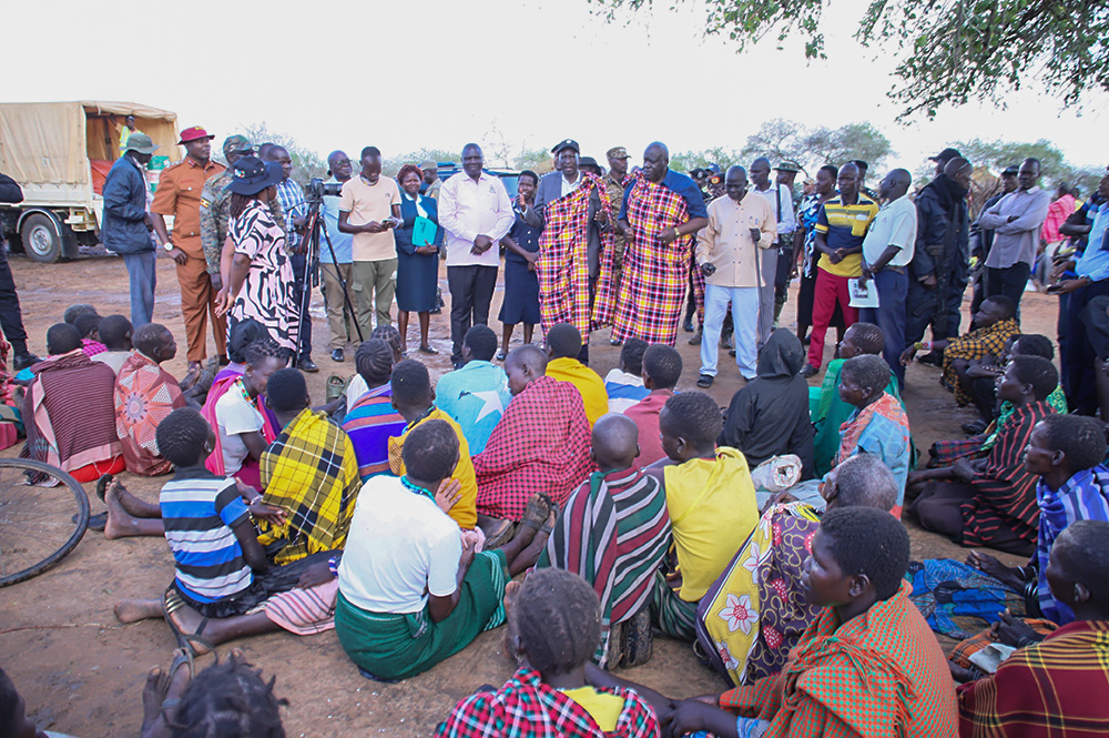 Ministers Hon. Sam Engola and Hon. John Baptist Lokii while addressing a section of the people in Napak district. (Courtesy photo)