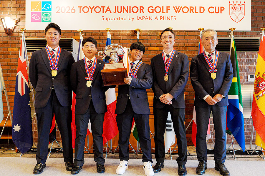 The Japanese boys and their officials pose with their trophy after the championship. Courtesy photo