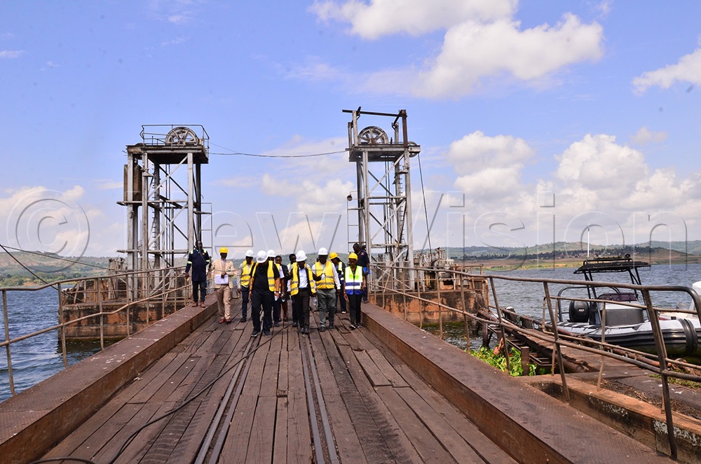 Ugandan officials and their Tanzanian counterparts from the railway and shipping sectors during a fact-finding mission to assess the state of Jinja Pier Port on Tuesday. (Photo by Jackie Nambogga)