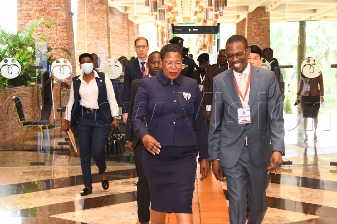 Speaker of parliament, Anita Among interacting with Attorney General Kiryowa Kiwanuka.
