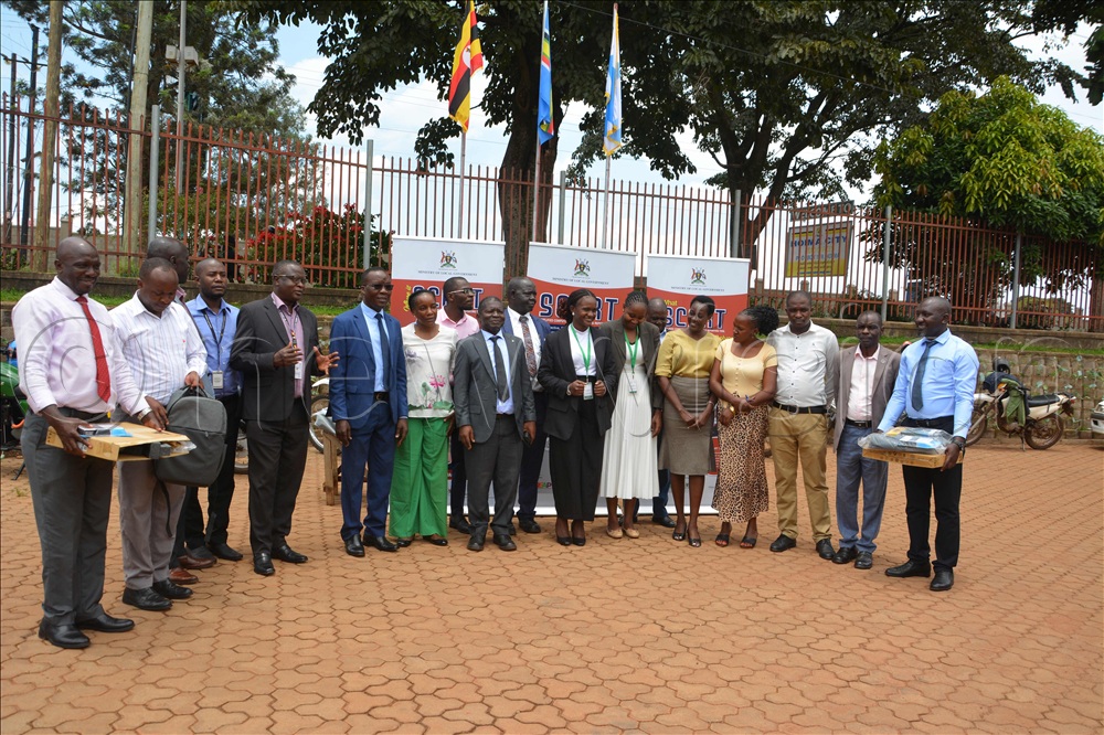 Ministry of Local Government officials posing for a photo with Hoima city technical staff